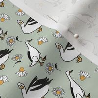 White ducks and chamomile flowers - mint green - pastel