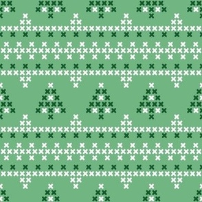 Cross stitch christmastrees on green