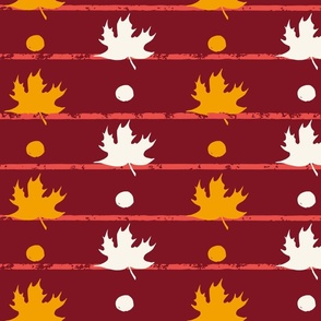 block print striped maple leaves in ivory and golden yellow with red stripes on deep burgundy red