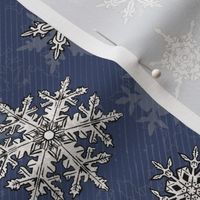Vintage style snowflakes on blue - medium