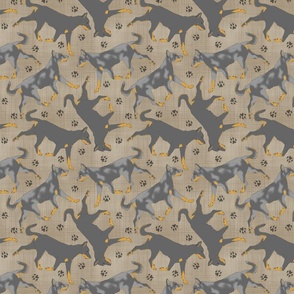 Trotting cropped Beaucerons and paw prints - faux linen