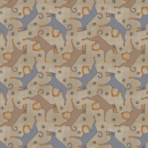 Trotting natural dilute Doberman Pinschers and paw prints - faux linen