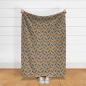 Trotting uncropped Doberman Pinschers and paw prints - faux linen