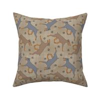 Trotting uncropped dilute Doberman Pinschers and paw prints - faux linen