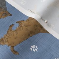 Trotting Australian Terriers and paw prints - faux denim