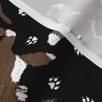 Trotting assorted Portuguese water dogs and paw prints - black