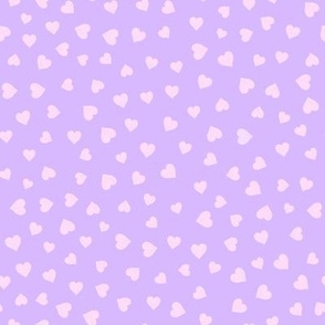 Pink hearts on purple dense