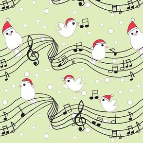 Musical Christmas birdies on green 