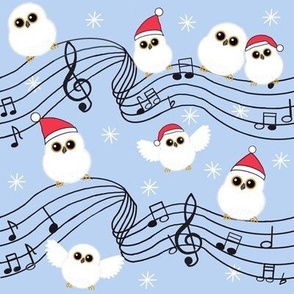 Musical Christmas baby snowy owls on  blue