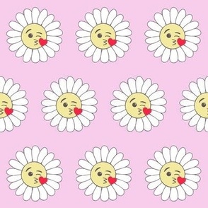 Emoji daisies blowing kisses on pink