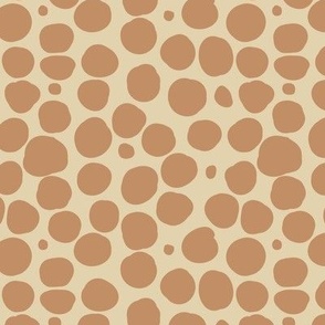Brown shapes on cream