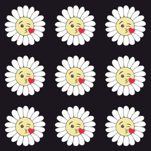 Emojidaisies blowing kisses on a black background 