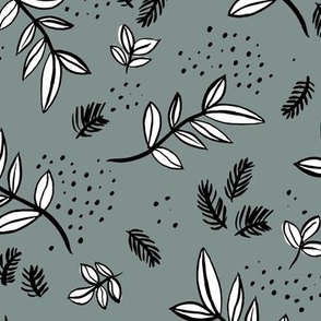 Raw ink winter garden with pine needles branches and leaves christmas spots black white on moody gray