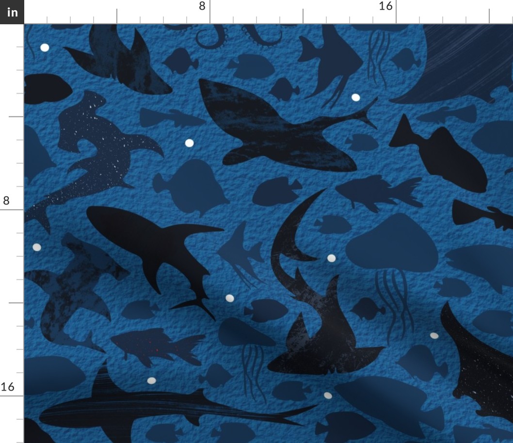 Fishes deep in the dark blue sea large