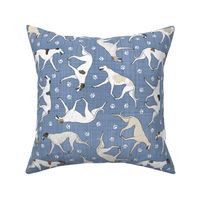 Trotting light Greyhounds and paw prints - faux denim