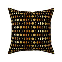 waxing and waning moon phases gold on black