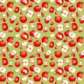 Small Scale Red Apples Slices Cores on Green