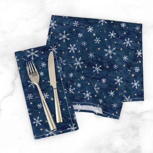 Shibori Snow and Stars on Dark Indigo (small scale) | Snowflakes and gold stars on arashi shibori linen pattern, block printed stars on navy blue, Christmas fabric, winter night sky.