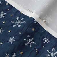 Shibori Snow and Stars on Dark Indigo (extra small scale) | Snowflakes and gold stars on arashi shibori linen pattern, block printed stars on navy blue, Christmas fabric, winter night sky.