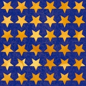 gold stars on  blue mottled background