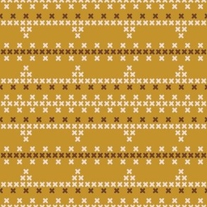 Cross stitch border pattern on mustard