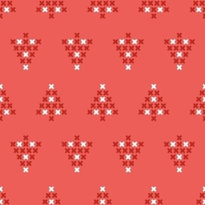 Modern Cross stitch Christmas trees pattern on coral