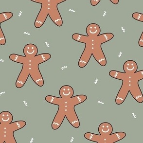 Boho Gingerbread Man Christmas Cookie on Muted Green