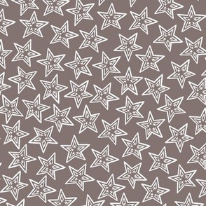 Celestial bodies, large white stars on a gray-brown background