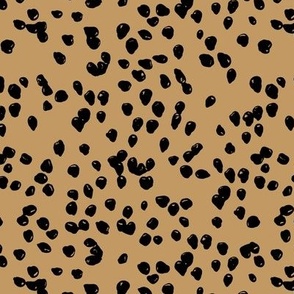 Chocolate covered raisins abstract minimalist spots animals print texture neutral black on camel yellow mustard