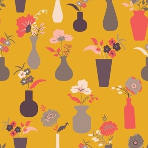 Flowers in vases on yellow