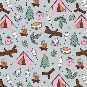 Winter wonderland camping trip outside adventures with campfire marshmallows and hot chocolate pine tree forest and wood logs pink burnt orange sage green lilac on soft gray
