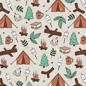 Winter wonderland camping trip outside adventures with campfire marshmallows and hot chocolate pine tree forest and wood logs mint green vintage orange caramel on beige sand