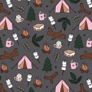 Winter wonderland camping trip outside adventures with campfire marshmallows and hot chocolate pine tree forest and wood logs green pink on charcoal gray