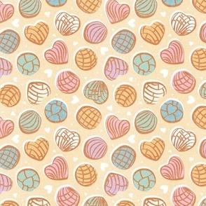 Tiny scale // Mexican pan dulce // pale yellow background multicolored conchas