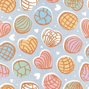 Small scale // Mexican pan dulce // pastel blue background multicolored conchas