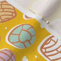 Small scale // Mexican pan dulce // yellow background multicolored conchas