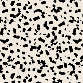 Paper confetti chocolate flakes spots and abstract dots Scandinavian style boho minimalist nursery painted design black on ivory cream