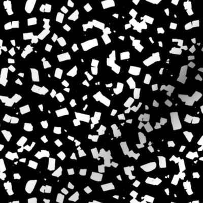 Paper confetti chocolate flakes spots and abstract dots Scandinavian style boho minimalist nursery painted design black and white monochrome