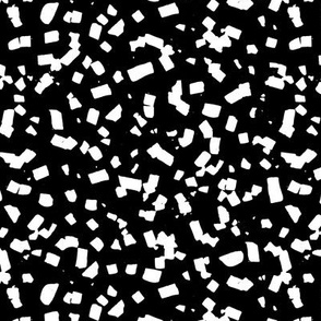 Paper confetti chocolate flakes spots and abstract dots Scandinavian style boho minimalist nursery painted design black and white monochrome