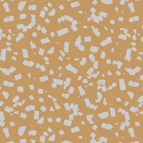 Paper confetti chocolate flakes spots and abstract dots Scandinavian style boho minimalist nursery painted design soft gray ochre mustard yellow 
