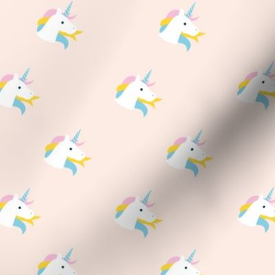 Sweet kawaii unicorn faces with long hair and magical horn kids fantasy dreams in yellow blue pink on blush cream