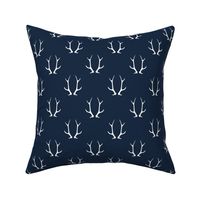 2" antlers on dark blue