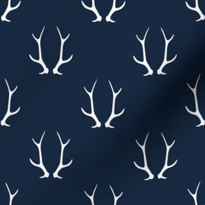 2" antlers on dark blue