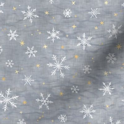 Shibori Snow and Stars in Silver and Gold (small scale) | Snowflakes and gold stars on arashi shibori linen pattern, block printed stars on feather gray, Christmas fabric, winter night sky.