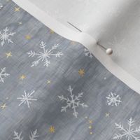 Shibori Snow and Stars in Silver and Gold (extra small scale) | Snowflakes and gold stars on arashi shibori linen pattern, block printed stars on feather gray, Christmas fabric, winter night sky.
