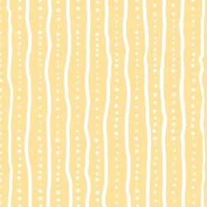 Wiggly lines and dots white on lemon yellow