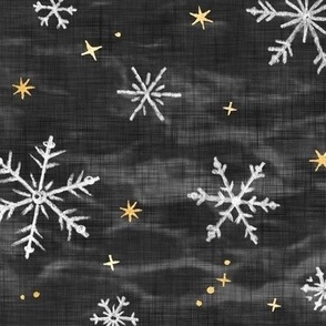 Shibori Snow and Stars in Charcoal (large scale) | Snowflakes and gold stars on arashi shibori linen pattern, block printed stars, black and gold, Christmas fabric, winter night sky.