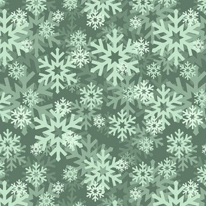 Ditsy green snowflakes