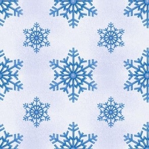 Blue snowflakes on white