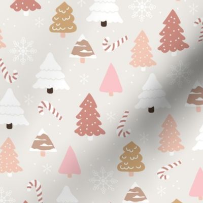 Boho christmas trees candy and snow flakes in beige pink green white on sand grey